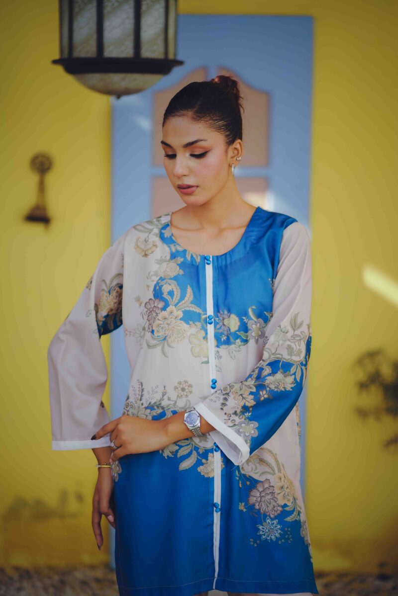 Zarrah from Meeras – The Classic Co-ords is a masterpiece of subtle beauty. Crafted from soft, breathable Swiss Lawn, this off-white co-ord features intricate black patterns that elevate its charm. Designed for modern women who value elegance and tradition, Zarrah is perfect for day events, casual outings, or festive gatherings — offering both comfort and class.